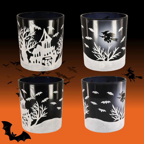Halloween candle, cinnamon scented, witch on a broom stick, scary house and glitter