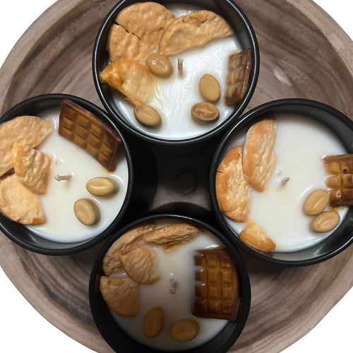 coffee and cake candle with coffee beans, chocolate and buscuits